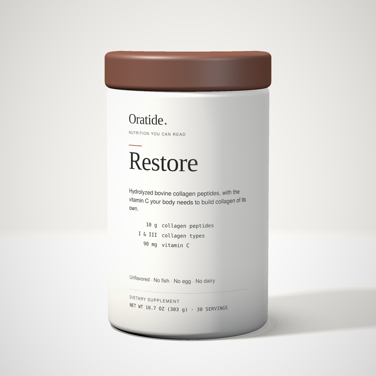 Oratide Restore, a cream 303 g tub with a dark brown lid, turned slightly and lit from the left on a pale surface.