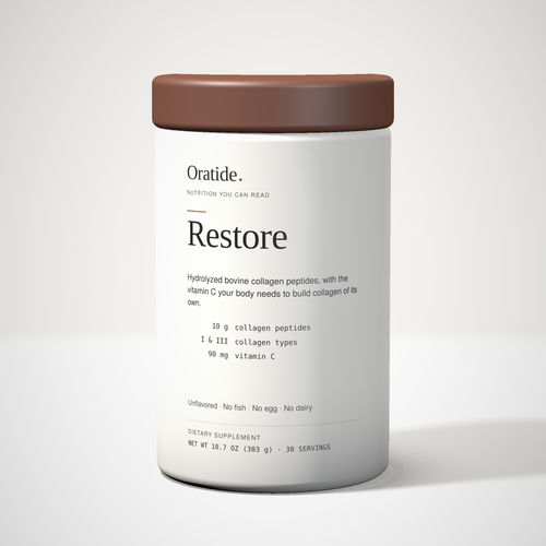 Oratide Restore, a cream 303 g tub with a dark brown lid, turned slightly and lit from the left on a pale surface.